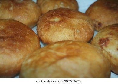 Closeup View Of Homemade Tasty Potato Bread Rolls Bun Placed Over White Tissue Paper.