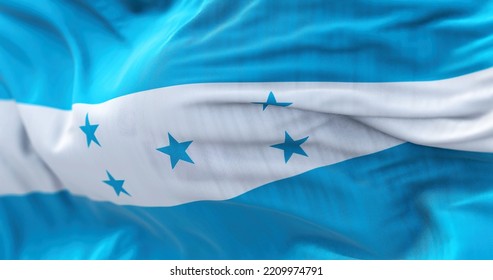 Close-up View Of The Honduras National Flag Waving In The Wind. The Republic Of Honduras Is A State Of Central America. Fabric Textured Background. Selective Focus