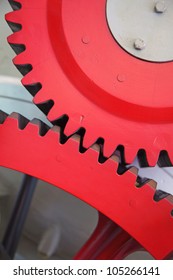 Closeup View Of Huge Cog Wheels Of The Train Engine