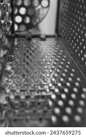 Closeup view of inner part of a square kitchen grater
