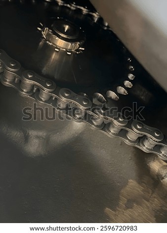 A close-up view of interconnected gears, chain, and pulley in an engine system. Precision and power in motion, showcasing the beauty of mechanical engineering. #Engineering #MachineParts