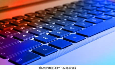 Closeup view of komputer (notebook) keyboard, colorized