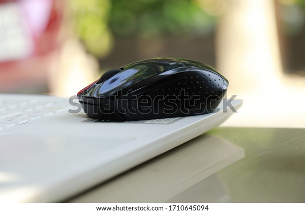 Closeup view of Laptop with\
mouse 