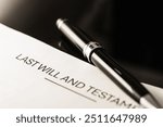 A close-up view of a last will and testament document with a sleek pen. Represents essential legal planning for individuals managing estates and asset distribution.