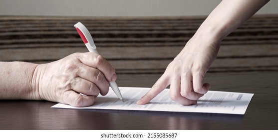 Closeup View Law Lady Notice Page Buy Work Care Read Concept Text Space. Age Alone Human Male Solicitor Arm Hold Teach Sign Adult Lone Ill Sick Man Notepad Pay Sell Tax Card Dark Black Wood Home Table