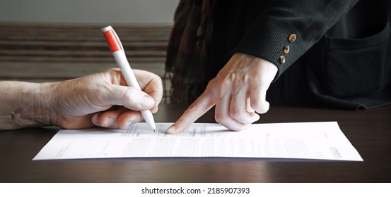 Closeup View Law Lady Notice Page Buy Work Care Read Concept Text Space. Age Alone Human Male Solicitor Arm Hold Teach Sign Adult Lone Ill Sick Man Notepad Pay Sell Tax Card Dark Black Wood Home Table