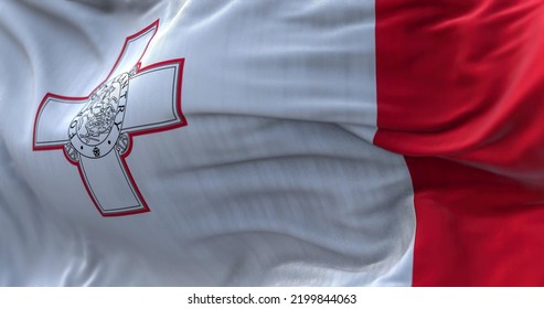 Close  up view the Maltese national flag waving in the wind  The Republic Malta is an island country in the Mediterranean Sea  Fabric textured background  Selective focus