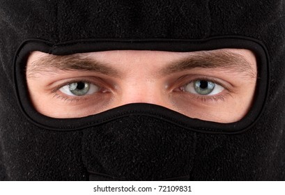 Close-up view of man in black balaclava