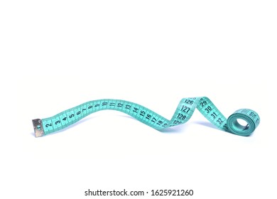 Closeup view of measuring tape isolated over white background - Shutterstock ID 1625921260
