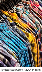 Close-up View Of Men Shirts Hanging On Hangers In Shop Display