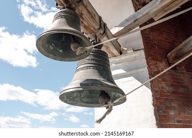 Close-up view of metal orthodox church bells. Bottom view of the Church bells