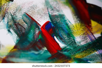 Close-up view of mixed colours on canvas. Chaos illustrated on painting. Fragment of artwork. Oil or gouache palette. Self-expression on paper. Modern art and creativity concept