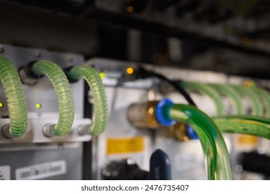 Close-up view of modern server hardware with liquid cooling pipes ensuring optimal temperature control. bitcoin mining farm