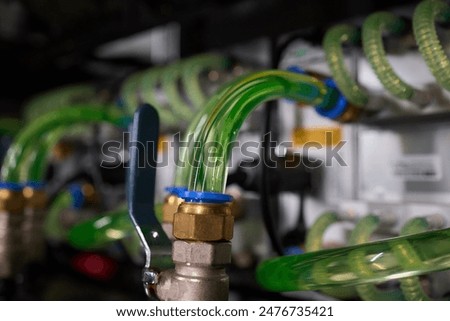 Close-up view of modern server hardware with liquid cooling pipes ensuring optimal temperature control. bitcoin mining farm