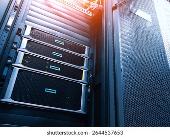 A close-up view of modern server rack units in a data center, showcasing advanced technology and organized hardware for efficient data processing and storage.