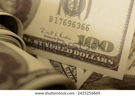 Close-up view of money banknotes, exemplifying financial security and success, wealth.