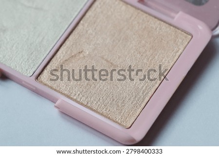 A close-up view of multiple layers in a compact electronic device.