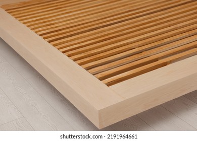 Closeup View Of New Wooden Bed Frame Indoors