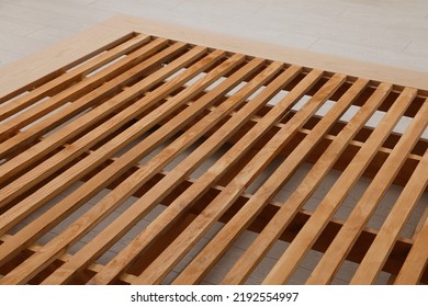 Closeup View Of New Wooden Bed Frame Indoors