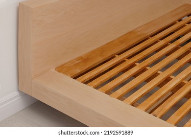 Closeup View Of New Wooden Bed Frame Indoors