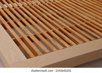 Closeup View Of New Wooden Bed Frame Indoors