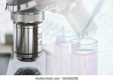 Closeup view of objective lens of a microscope blended with molecular structures, periodic table of elements and a clear chemical droplet on a pipette. Background for science and experiment concept.