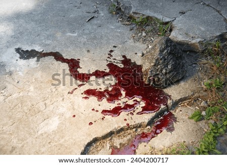 Closeup view old attack crush big heavy beat boulder hit tool holy faith male human hand martyr victim lay injury cut life. Evil hurt fear close up biblic dirt flow red drip land body corpse arm scene