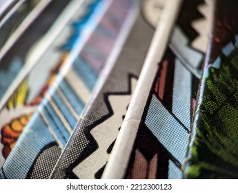 Closeup View Of An Old Comic Book Collection Creates A Colorful Background Paper Texture With Abstract Shapes