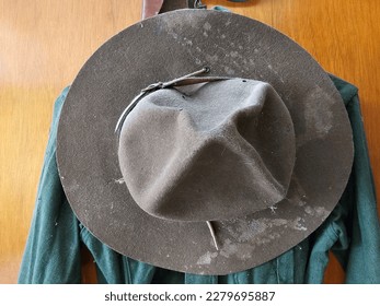 A closeup view of an old, dirty boy scout hat. - Shutterstock ID 2279695887