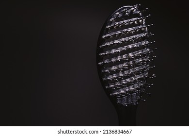 Closeup View Of Old Dirty And Used Hairbrush With Dirt And Hairs On It. 