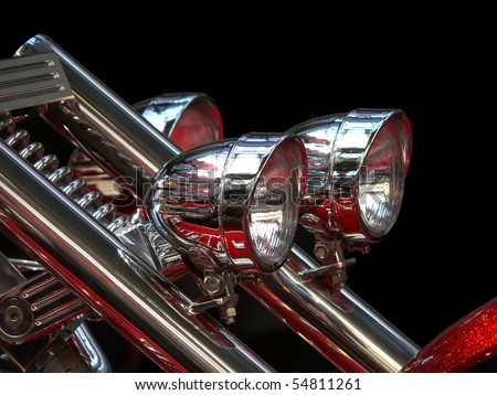 Close-up view on chrome headlights of luxury bike