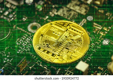 Close-up view on metal physical bitcoin cryptocurrency. BTC placed on top of the motherboard chip. Lots of connections slots and electronical elements around. Binary code with green gradient in the bg