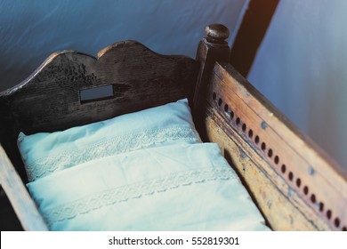 Close-up View On Old Infant Cradle 