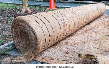 Closeup View On A Roll Of Soil Erosion Control Mat Or Blanket Which Is Made With Full Coconut Film With Biodegradable Top And Bottom Net. 