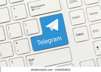 Close-up view on white conceptual keyboard - Telegram (blue key with logotype) - Shutterstock ID 1416454415