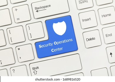 Close-up View On White Conceptual Keyboard - Security Operations Center (blue Key)