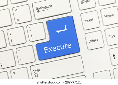 Close-up view on white conceptual keyboard - Execute (blue key)