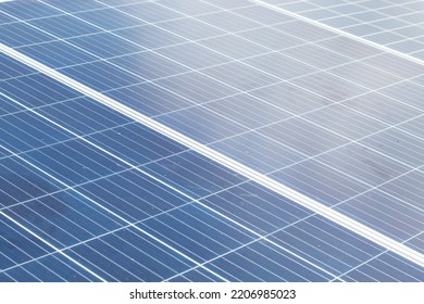 Closeup View Of Photovoltaic Panels Surface Which Installed On The Building's Roof After Washing And Cleaning By The Company's Staffs In The Evening Of The Day.