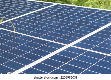 Closeup View Of Photovoltaic Panels Surface Which Installed On The Building's Roof After Washing And Cleaning By The Company's Staffs In The Evening Of The Day.