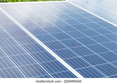 Closeup View Of Photovoltaic Panels Surface Which Installed On The Building's Roof After Washing And Cleaning By The Company's Staffs In The Evening Of The Day.