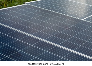 Closeup View Of Photovoltaic Panels Surface Which Installed On The Building's Roof After Washing And Cleaning By The Company's Staffs In The Evening Of The Day.