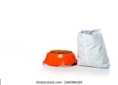 Close-up View Of Plastic Bowl And Bag With Animal Food Isolated On White