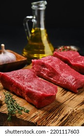 Closeup View Of Raw Boneless Strip Steak Loin With Spice On Cutting Board