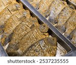 Close-up view of raw seasoned pieces of giant gourami fish (Osphronemus goramy)