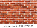 A close-up view of a red brick wall with white mortar.