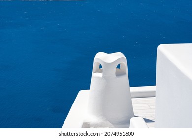 Close-up view of the roof chimney of traditional buildings in Santorini island, Greece - Powered by Shutterstock