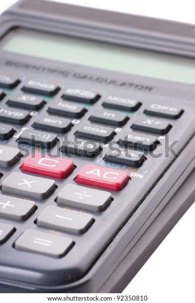 Closeup view of scientific calculator over\
white background