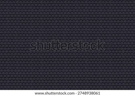 A close-up view of a seamless black hexagonal pattern texture. This dark, monochromatic honeycomb design features a rough, rubber-like surface, making it ideal for use as an industrial background, technological wallpaper, or modern geometric overlay.