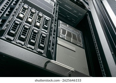 A close-up view of a server rack filled with organized network equipment, showcasing technology infrastructure and hardware management in a modern data center setup.