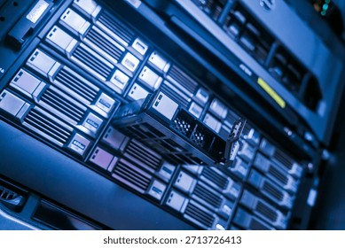 A close-up view of a server rack showcasing a data storage component. This image highlights modern technology and provides insight into server room management and infrastructure. - Powered by Shutterstock - Get 15% off with code: PIKWIZARD15